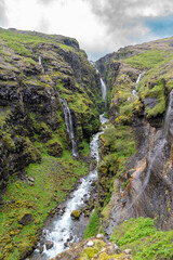 Obraz premium River going through the canyon - Glymur Waterfall, Iceland