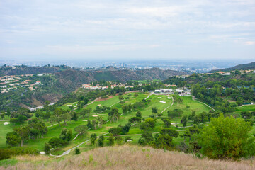 Views of the Mountain Gate Country Club in Brentwood with views of the  Los Angeles cityscape in...