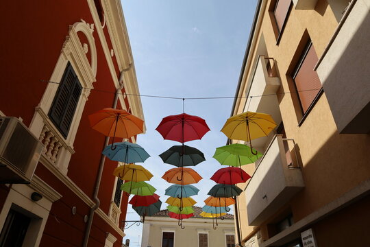 Street with colorful umbrellas in Novigrad, Croatia