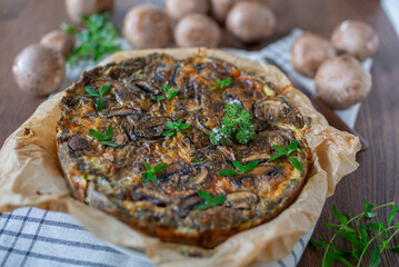 Quiche - open tart pie with morel mushrooms, onion 