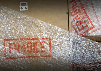 Frame and bubble wrap for transport with fragile word