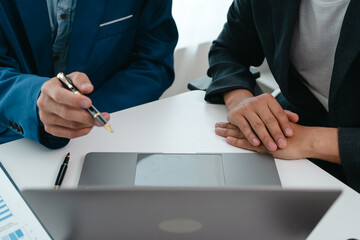 A team of young entrepreneurs and Asian startups held a business meeting. to achieve the marketing...