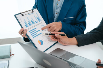 A team of young entrepreneurs and Asian startups held a business meeting. to achieve the marketing...