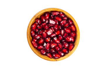 Top view of fresh ripe pomegranate seeds in wooden bowl isolated on white background with clipping path.