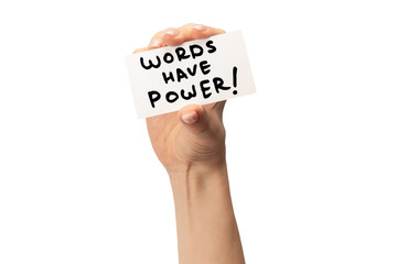 Words have power text on a card in a woman hand isolated.