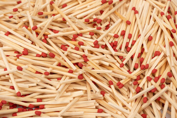 Group of new matchsticks as a background.