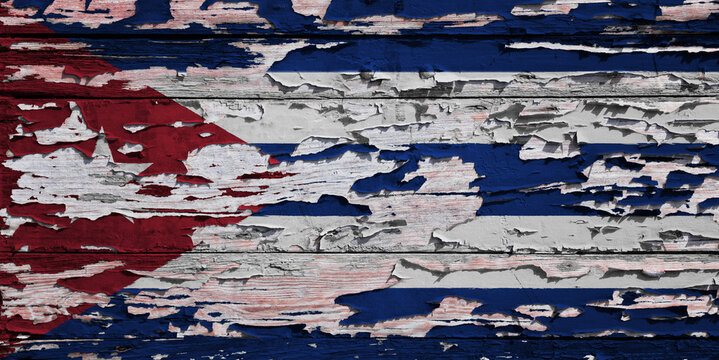 Cuban flag painted on a weathered wooden wall
