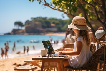 Summer business. Child working on laptop on the beach. Freelance concept. . Little freelancer using computer, remote working during vacation