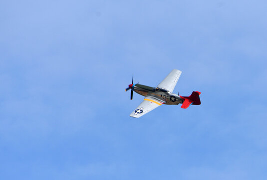 Vintage P51 Mustang "Tall in the Saddle" A33 Red Tail  in flight.