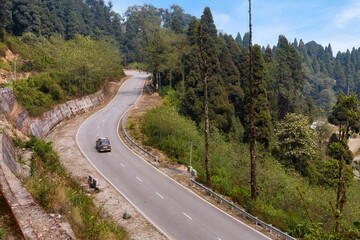 Aerial view of a mountain highway road with scenic mountain landscape at Lava view point at Darjeeling, West Bengal, India