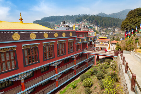 Kagyu Thekchen Ling Monastery, popularly known as the Lava Monastery, with view of cityscape on the mountain slopes at Kalimpong, West Bengal, India. 