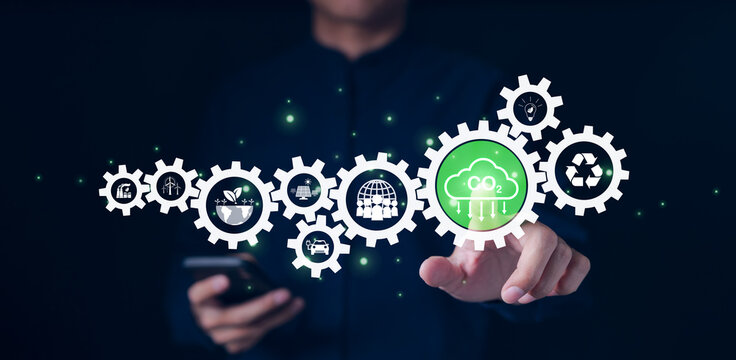 Reduce CO2 emission concept. Businessman touching environmental icons. Technology Net zero and Carbon neutrality, Carbon footprint, Sustainable development and green business, limit global warming,