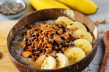 Chia Pudding Bowl with Banana, Granola and Cinnamon, Healthy Breakfast, Vegetarian Food