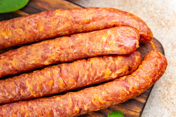 smoked sausage meat pork, beef, fresh appetizer meal food snack on the table copy space food...