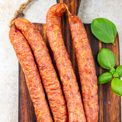 smoked sausage meat pork, beef, fresh appetizer meal food snack on the table copy space food background rustic top view