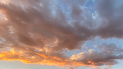 Pink Clouds at Sunset over the mountains in Snowmass Colorado