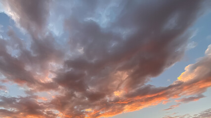 Pink Clouds at Sunset over the mountains in Snowmass Colorado