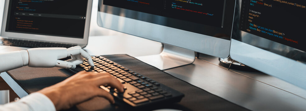 Program coding automation by generative artificial intelligence or AI concept. Collaboration between robotic hand and human software developer solving, debugging or writing script.Trailblazing