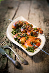 tasty fresh shrimp skewers on plate