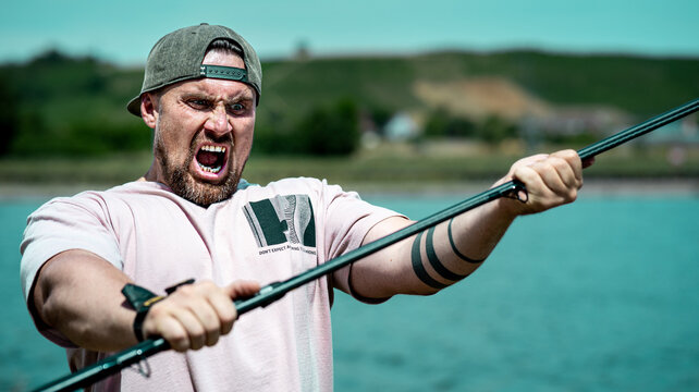 men hold fishing rod, carpfishing, angling, fishing