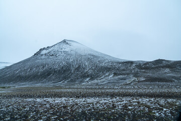 Summer snow in the mountains of Iceland along the Ring Road, in the north near Myvatn