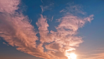 pretty sunrise gold clouds on the sky background - photo of nature