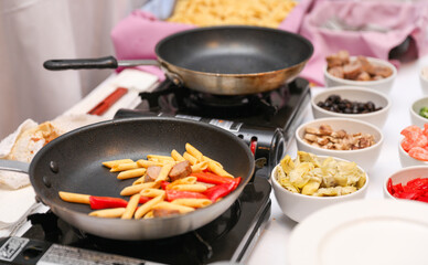 Sizzling culinary artistry in a hot frypan, epitomizing the joy and creativity of home cooking