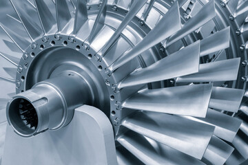 Steel blades of turbine propeller 3D printing. Close-up view. Selected focus on foreground,...