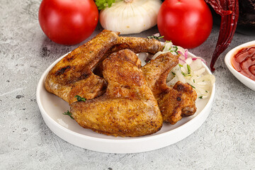 Grilled chicken wings with sauce