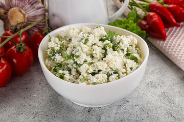 Curd cheese with green herbs