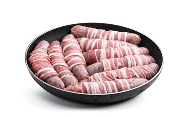 Sausages wrapped in bacon in frying pan isolated on white background