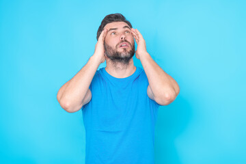 Pensive man isolated on studio background thinking. Thoughtful man planning problem solution, lost in thoughts consider idea. Man confuse. Uncertain with doubt, thinking. Pensive concept.