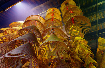 Cloes up shot of many coil style incense in A-Ma Temple