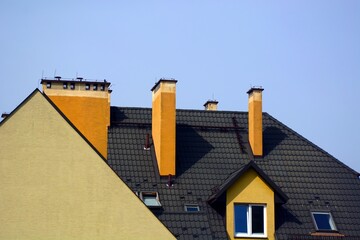 House with many chimneys, view from the roof of the house