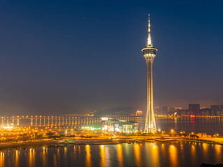 Fototapeta na wymiar Sunset high angle view of the Macau Tower Convention and Entertainment Center and cityscape