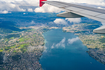 Aerial view of Zuerich and Lake Zuerich on a cloudy summer day photographed from passenger plane....