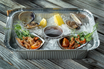 Raw uncooked clams shells shellfish with ingredients.