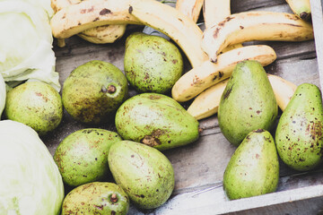 Display of fruits and vegetables in a traditional Colombian market square