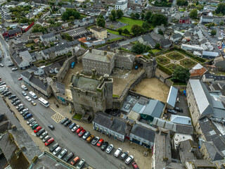 Aerial view of Roscrea castle and town in Central Ireland with tower house keep, enclosing walls...