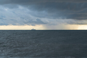 storm at sea waves clouds rain wind