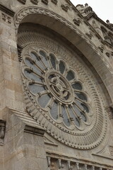 Detail of the rose window of the Basilica of Santa Lucia and the Sacred Heart of Jesus in Viana do Castelo (Portugal).