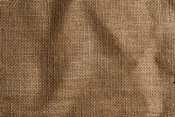 background of handmade fabric sewn with old hemp threads horizontally