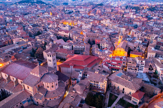 Aerial view of historic district of Vic town with ancient cathedral on winter twilight, Catalonia, Spain..