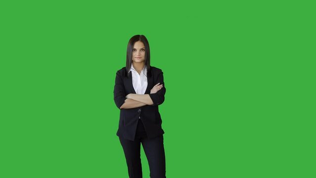 Attractive Young Businesswoman Standing Against Green Screen Background