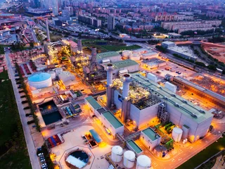 Fotobehang Aerial night view of power plant and waste treatment plant in Barcelona .. © JackF