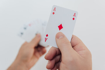 Card games.Table gambling. Ace of diamonds in hand