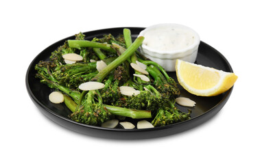 Tasty cooked broccolini with almonds, lemon and sauce isolated on white