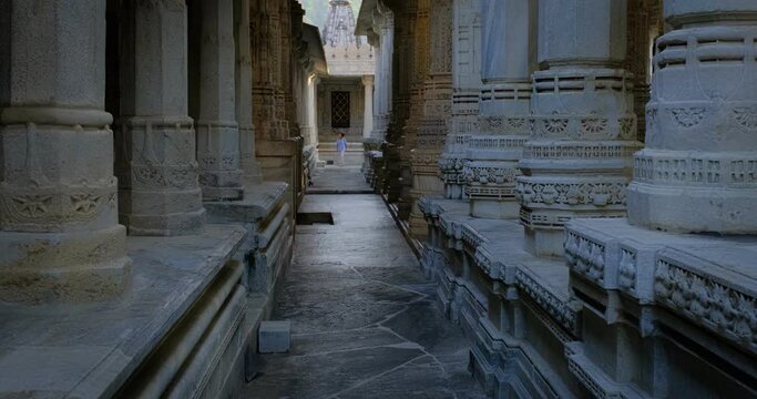 Interior of beautiful Ranakpur Jain temple or Chaturmukha Dharana Vihara. Marble ancient medieval carved sculpture carvings of sacred religious place of jainism worship. Ranakpur, Rajasthan. India