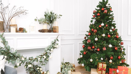 Christmas tree decorated holiday winter xmas celebration present gift to family decor bauble ornament golden ball in cozy living room. Merry Christmas and happy new year festival traditional concept