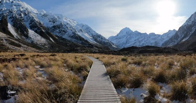 Winter hiking boardwalk near Aoraki Mount Cook in New Zealand alpine landscape